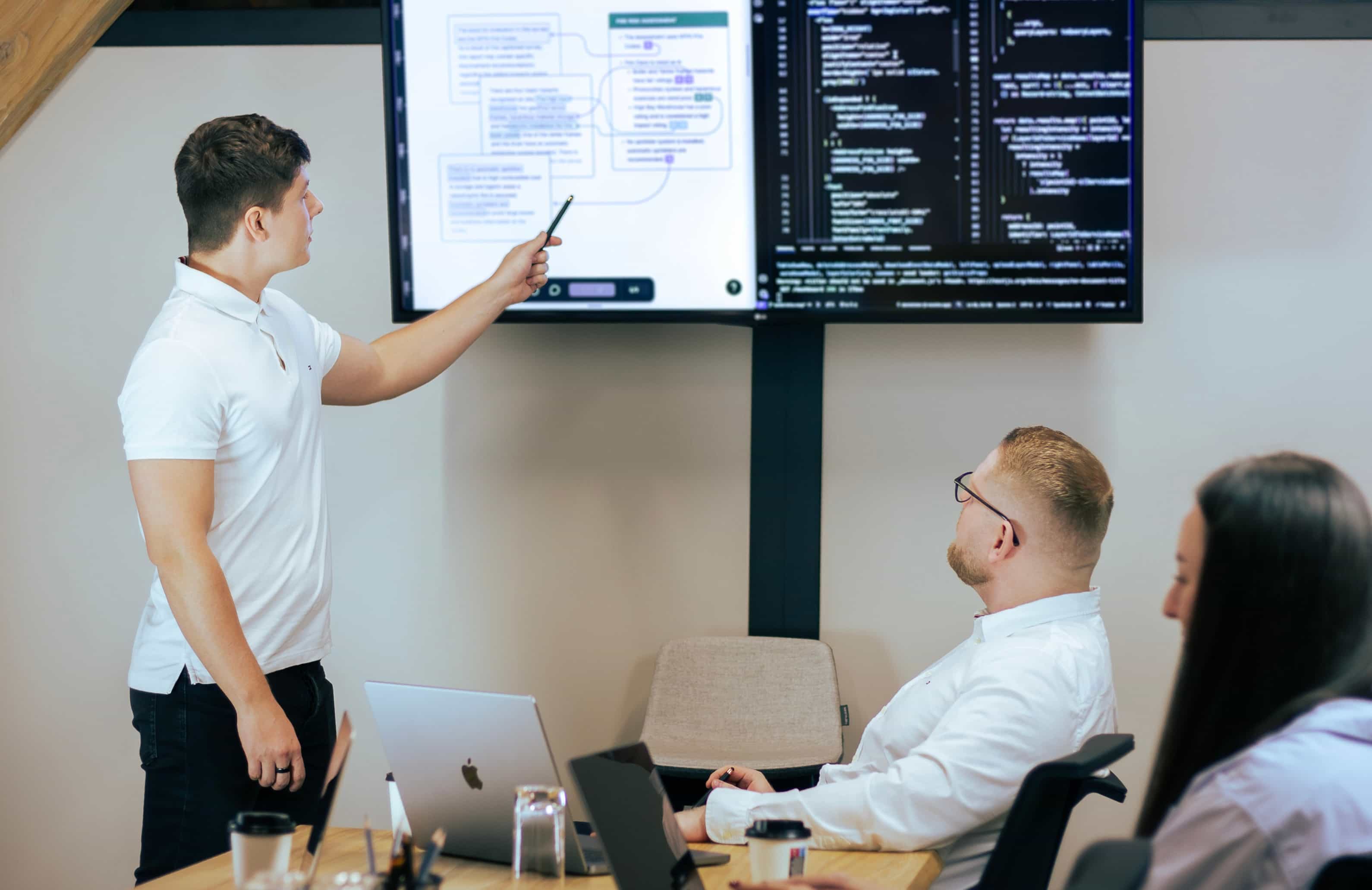 Team members collaborating around a conference table, sharing ideas during a brainstorming session